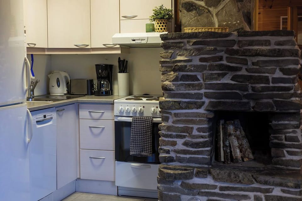Comfort Cabin, 2 Bedrooms | Private kitchen | Coffee/tea maker, full-size fridge, microwave, oven