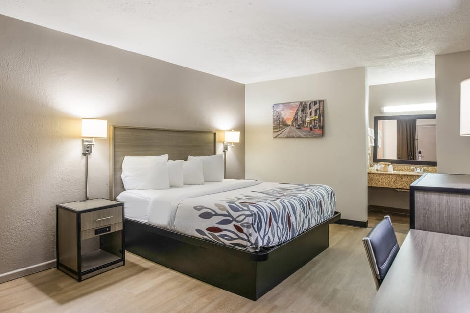 Desk, laptop workspace, blackout drapes, free cribs/infant beds