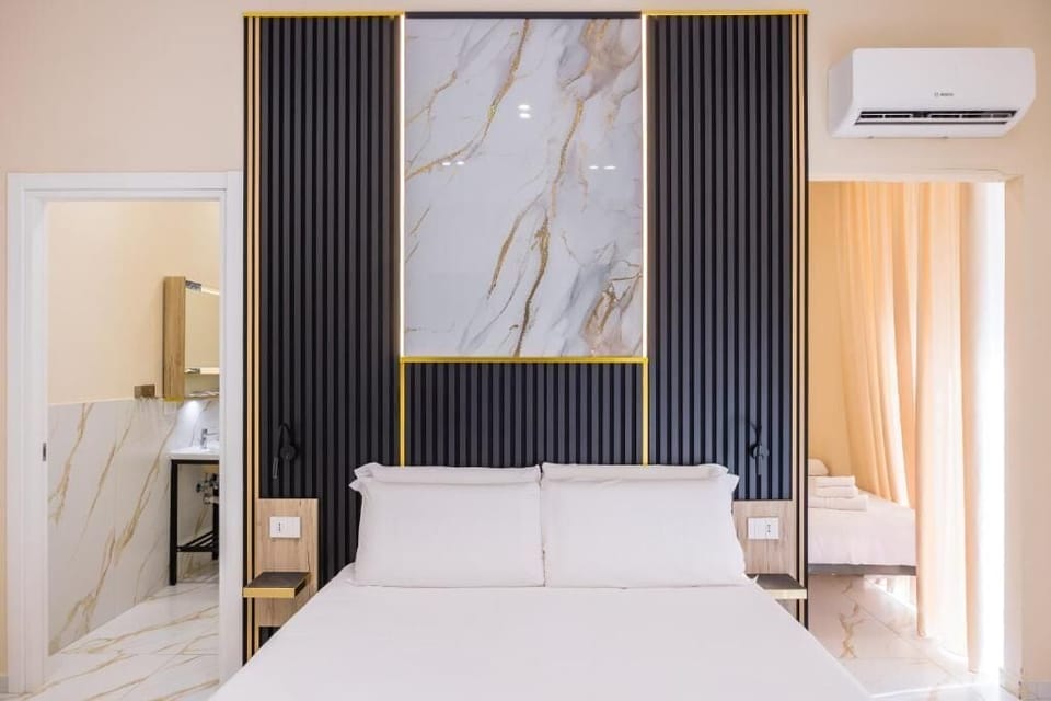 Superior Quadruple Room, City View | Desk, laptop workspace, blackout drapes, WiFi (free)