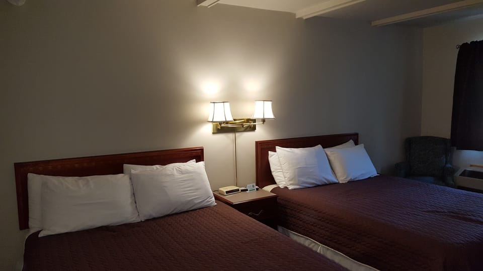 Blackout drapes, iron/ironing board, free WiFi, bed sheets