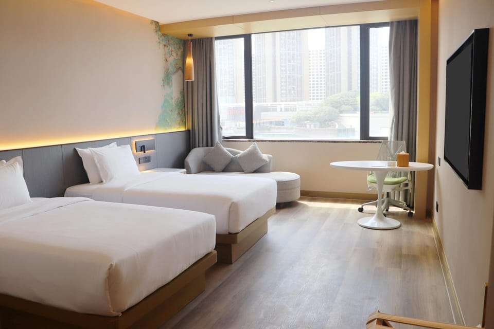 Superior Twin Room | Minibar, in-room safe, desk, laptop workspace