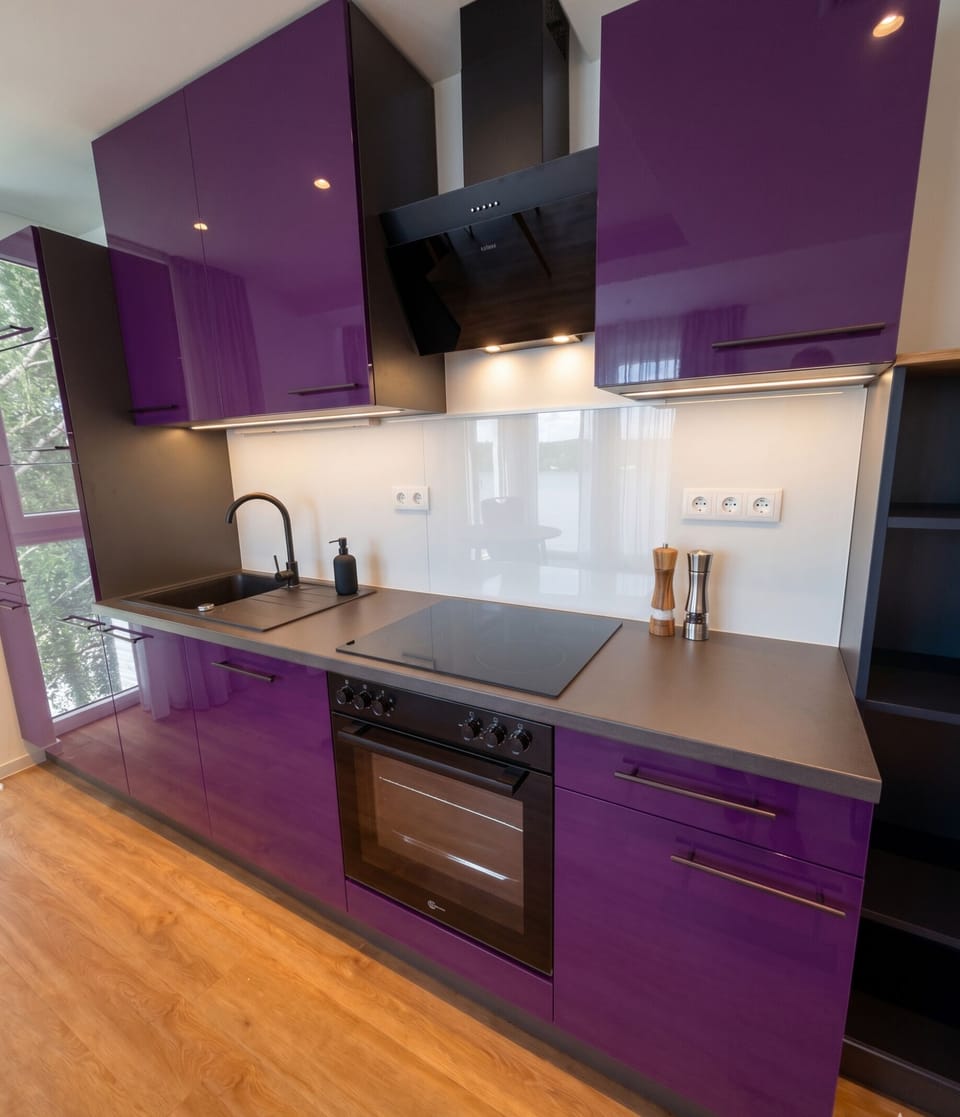 Deluxe Suite, Balcony | Private kitchen | Electric kettle, highchair