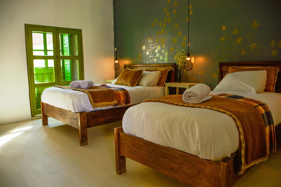 Triple Room, Shared Bathroom | Individually decorated, individually furnished, free cribs/infant beds