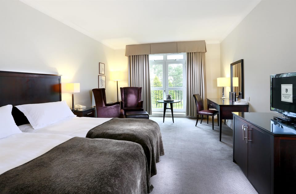 Hypo-allergenic bedding, minibar, in-room safe, desk