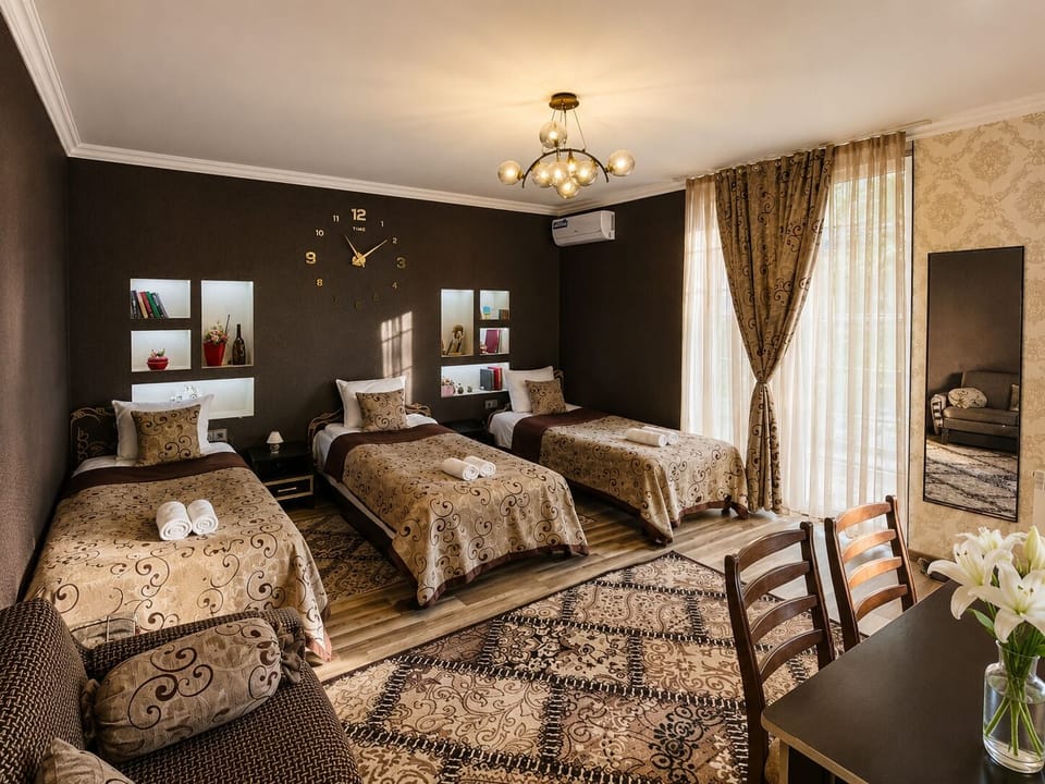 Comfort Quadruple Room, Garden View | Desk, laptop workspace, WiFi (free)