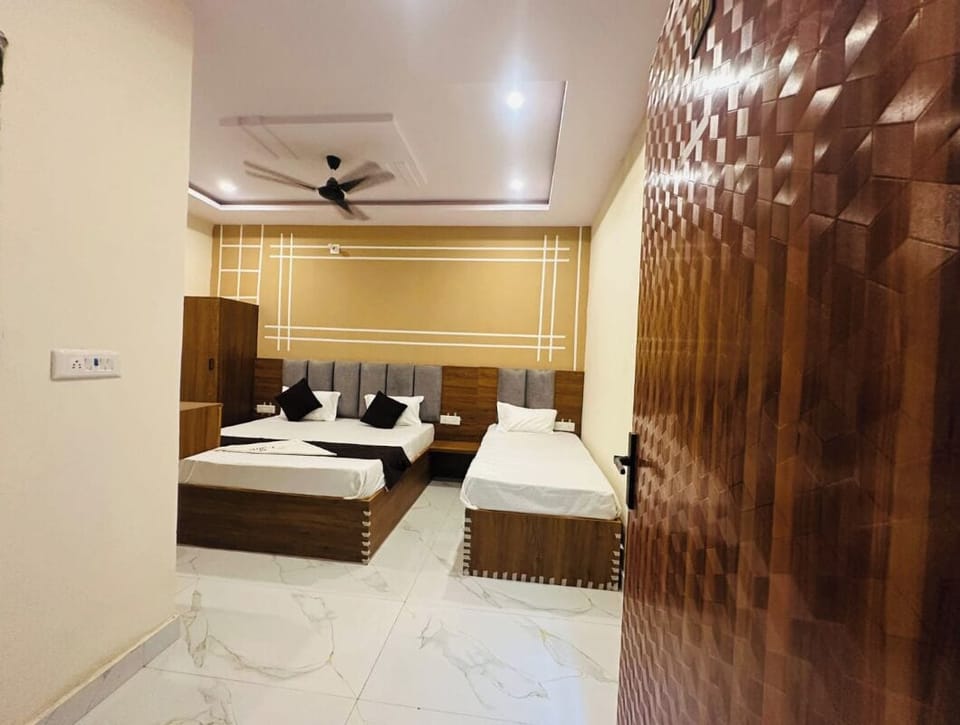 Deluxe Triple Room | Bed sheets