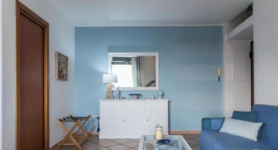 Apartment, Balcony, Sea View | Living area | TV, fireplace