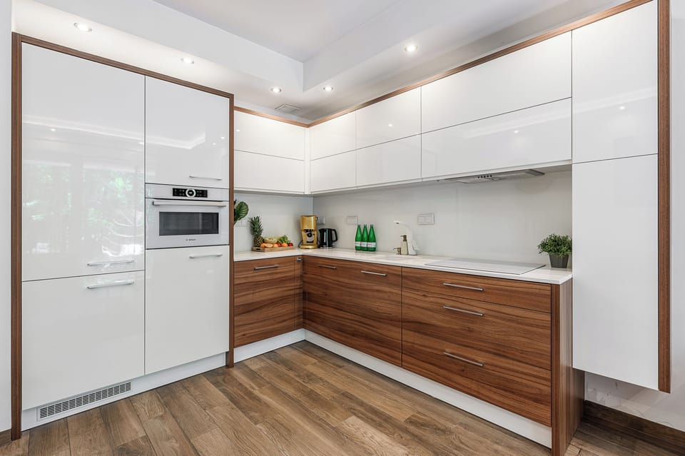Deluxe Apartment, 2 Bedrooms, Courtyard View | Private kitchen | Espresso maker, electric kettle, highchair, griddle