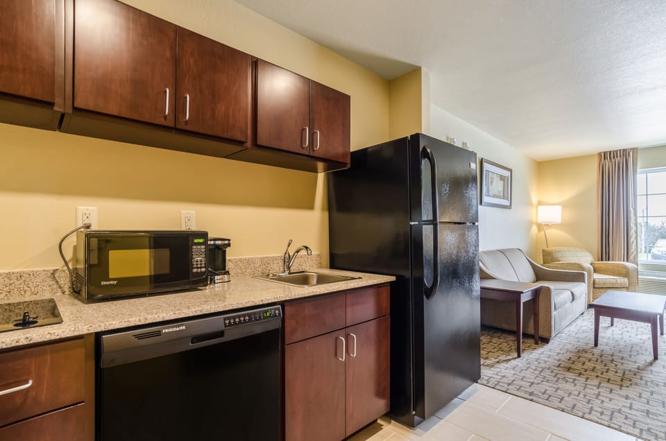 Suite, 1 King Bed with Sofa bed, Accessible (Extended Stay, Roll-In Shower) | Private kitchenette | Coffee/tea maker, fridge, microwave
