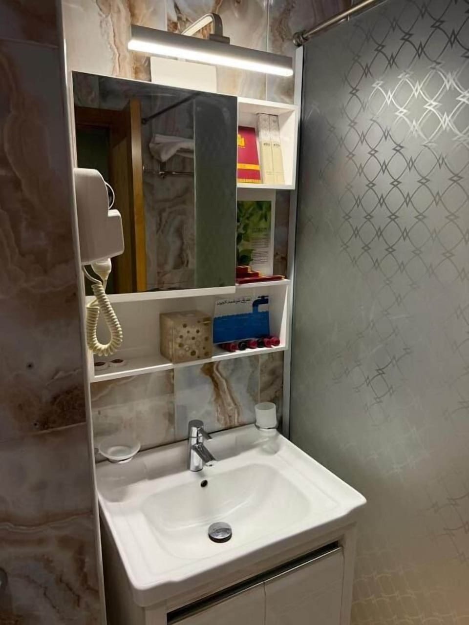 Rainfall showerhead, hair dryer, slippers, towels