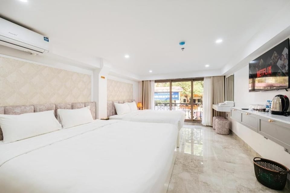 Family Room, Courtyard View | In-room safe, desk, laptop workspace, blackout drapes
