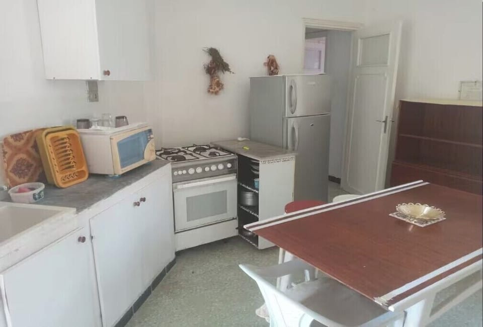 Apartment, Beach View, Beachfront | Private kitchen | Full-size fridge, microwave, cookware/dishes/utensils, cleaning supplies