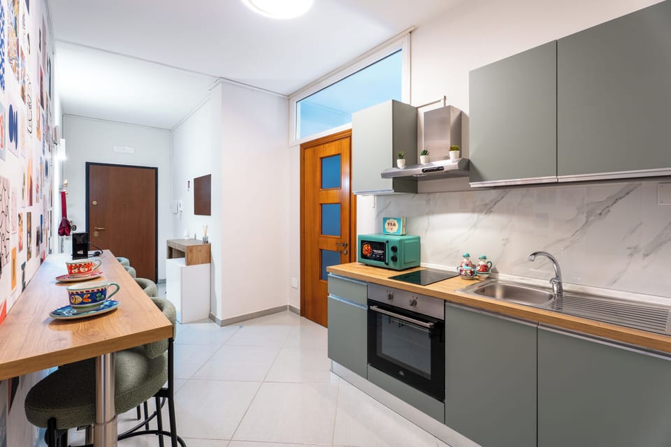 Apartment, Balcony, Partial Sea View | Private kitchen | Espresso maker, coffee/tea maker, fridge, microwave