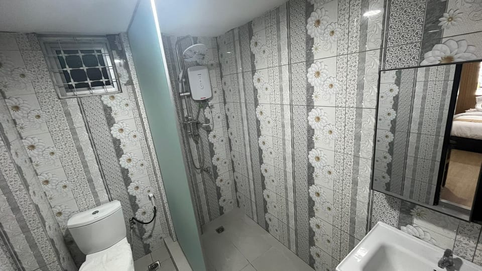 Deluxe Twin Room, Balcony | Bathroom | Shower, slippers, towels, soap
