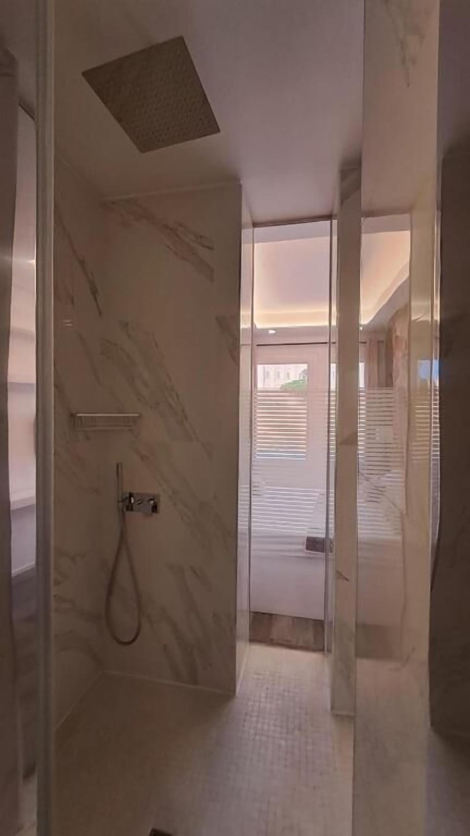 Deluxe Double Room, Balcony, Partial Ocean View | Bathroom | Shower, free toiletries, hair dryer, towels