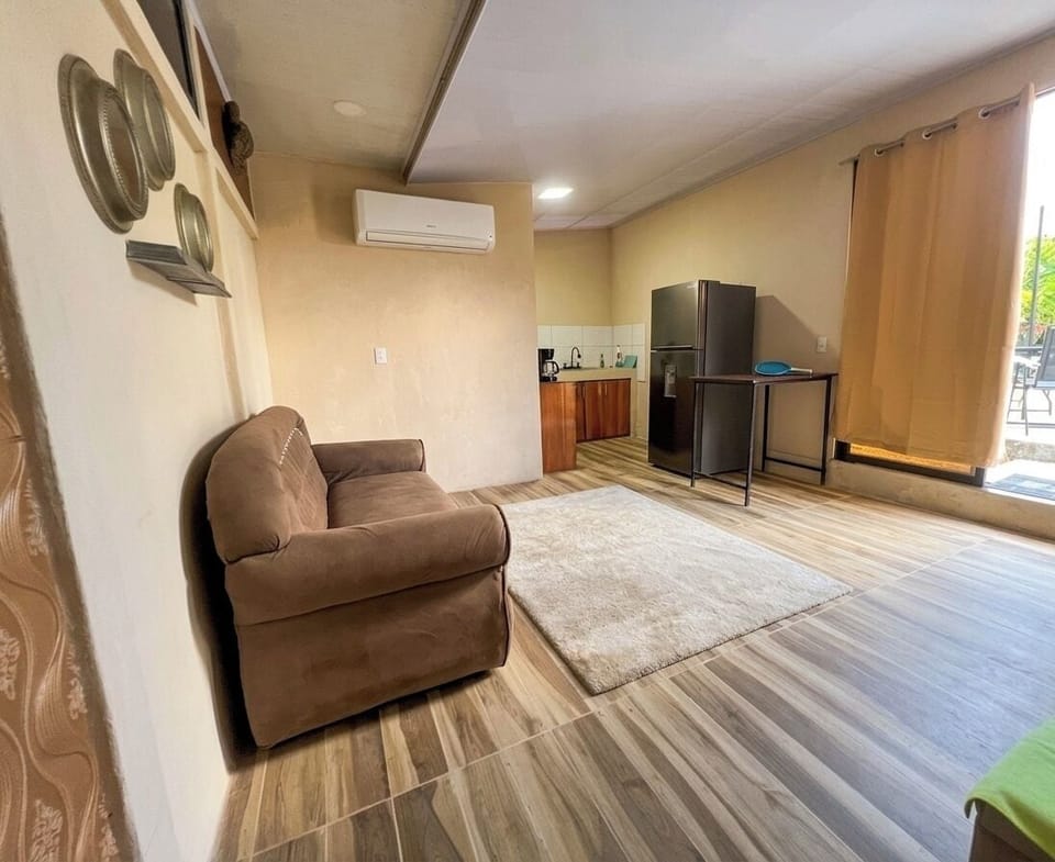 Family Apartment, Pool View | Living area