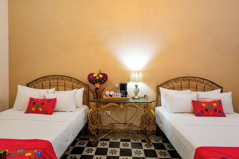 Minibar (free items), iron/ironing board, WiFi (free), bed sheets