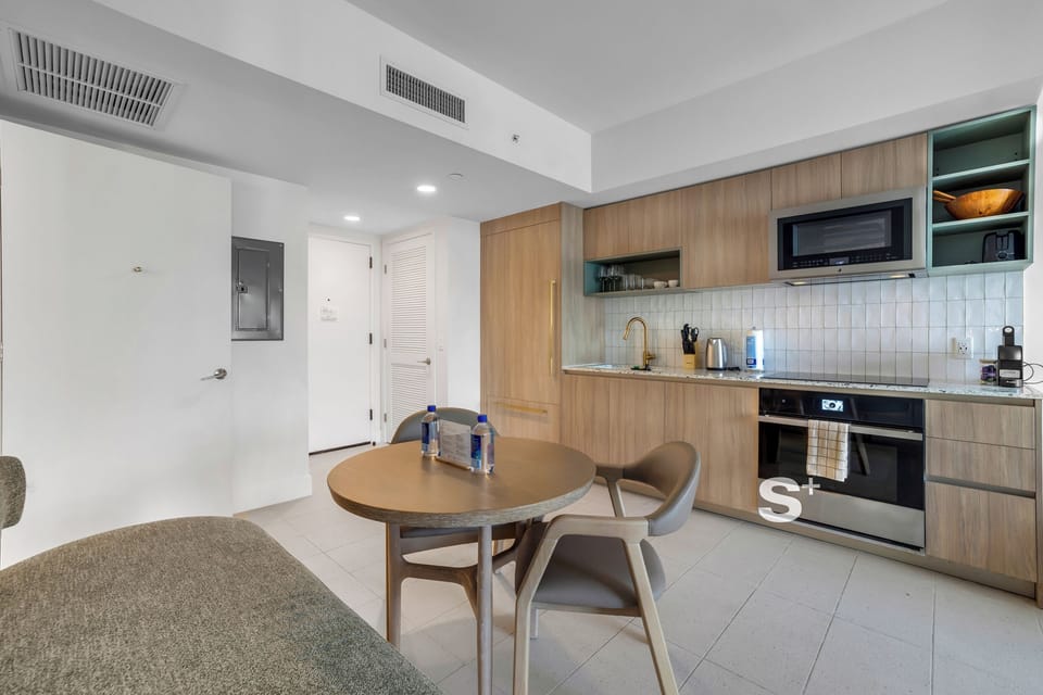 Condo, Balcony, City View | Private kitchen | Espresso maker, fridge, microwave, dishwasher
