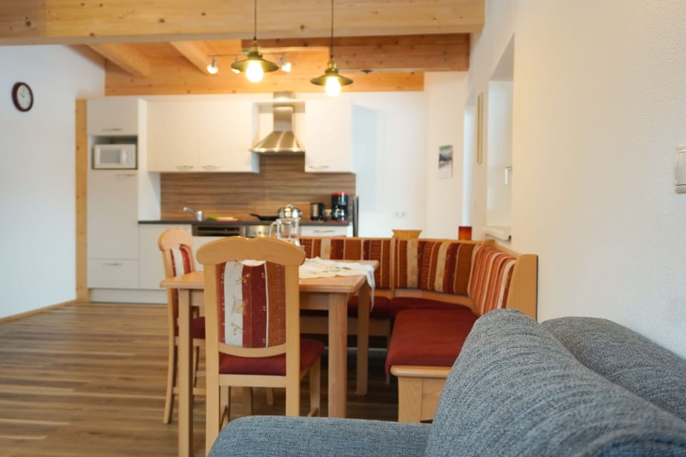 Family Apartment, 2 Bedrooms, Kitchen, Courtyard View | Living area | 43-inch flat-screen TV with satellite channels, TV, toys