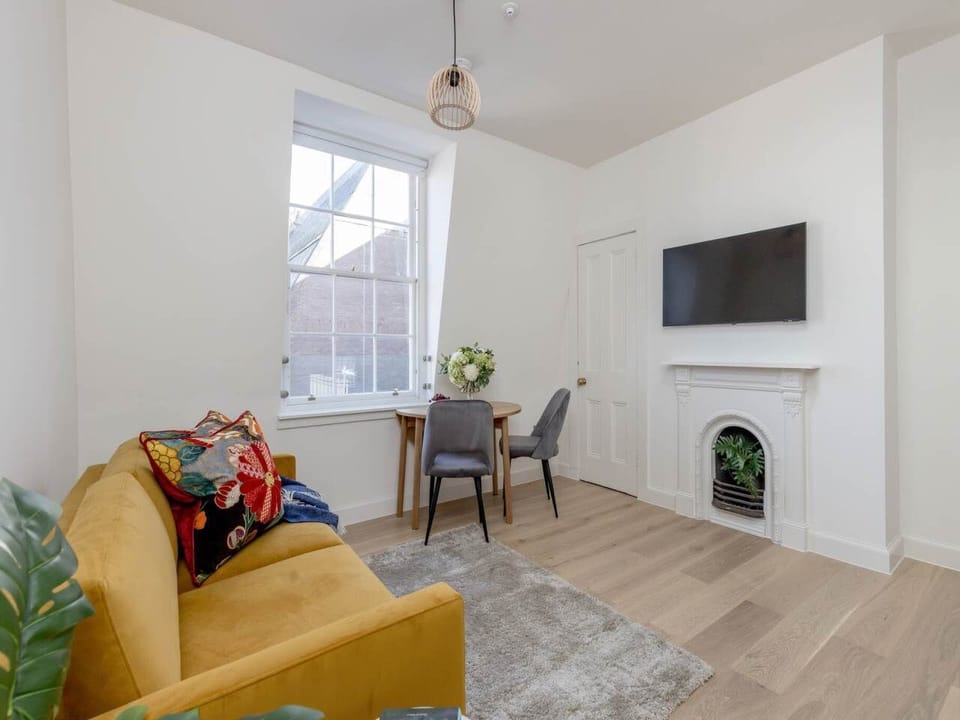 Apartment | Living area | 24-inch Smart TV with digital channels