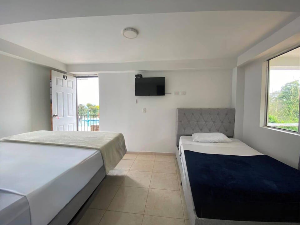 Basic Quadruple Room, Pool View | WiFi (free)