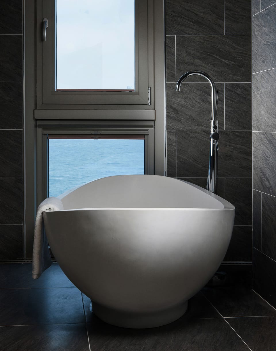 Suite, Ocean View | Bathroom | Shower, free toiletries, hair dryer, bathrobes