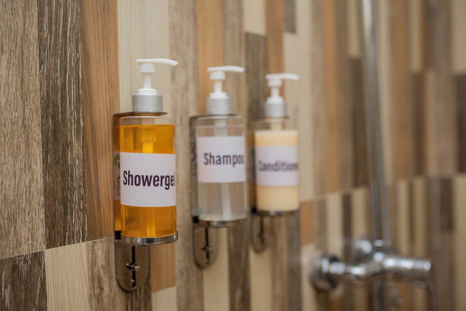 Shower, free toiletries, towels, soap
