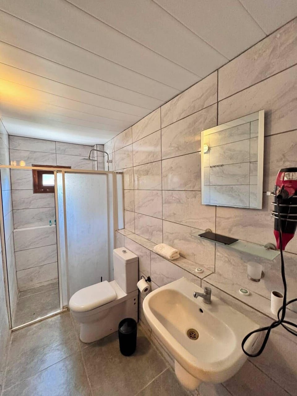Suite, Garden View | Bathroom | Shower, hair dryer, towels, soap