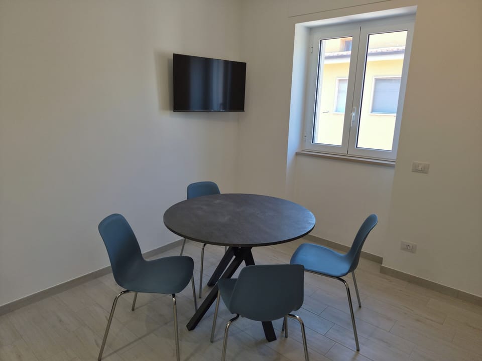 Comfort Apartment | Living area | 40-inch Smart TV with digital channels