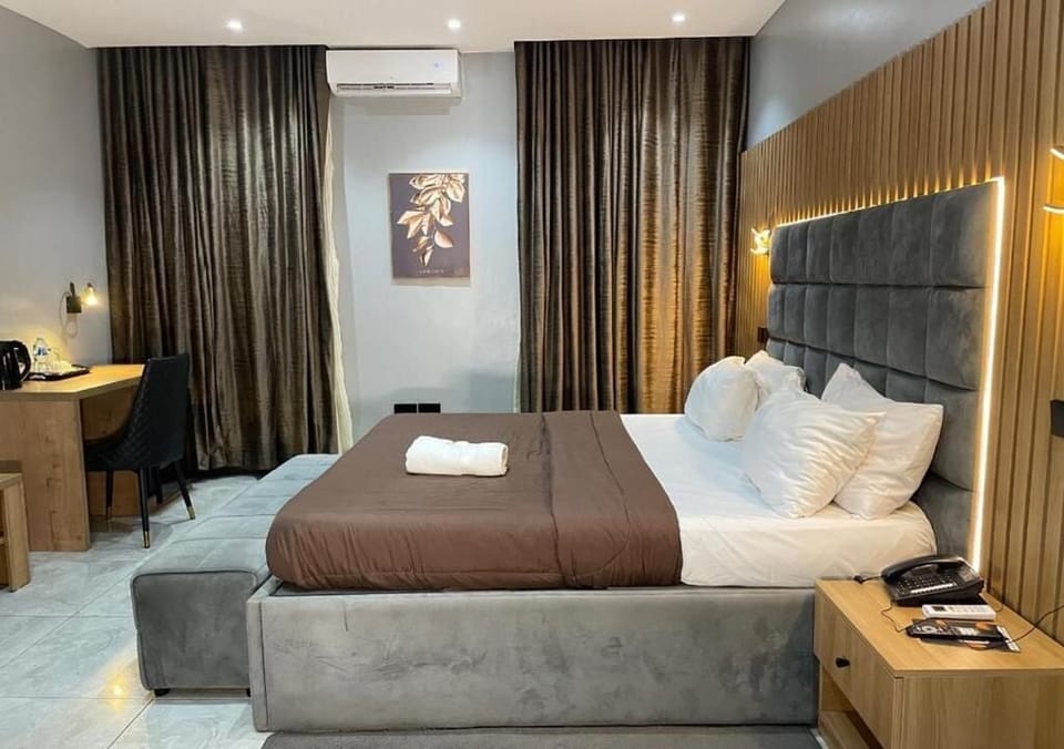Classic Room, Balcony, City View | Desk, laptop workspace, blackout drapes, soundproofing