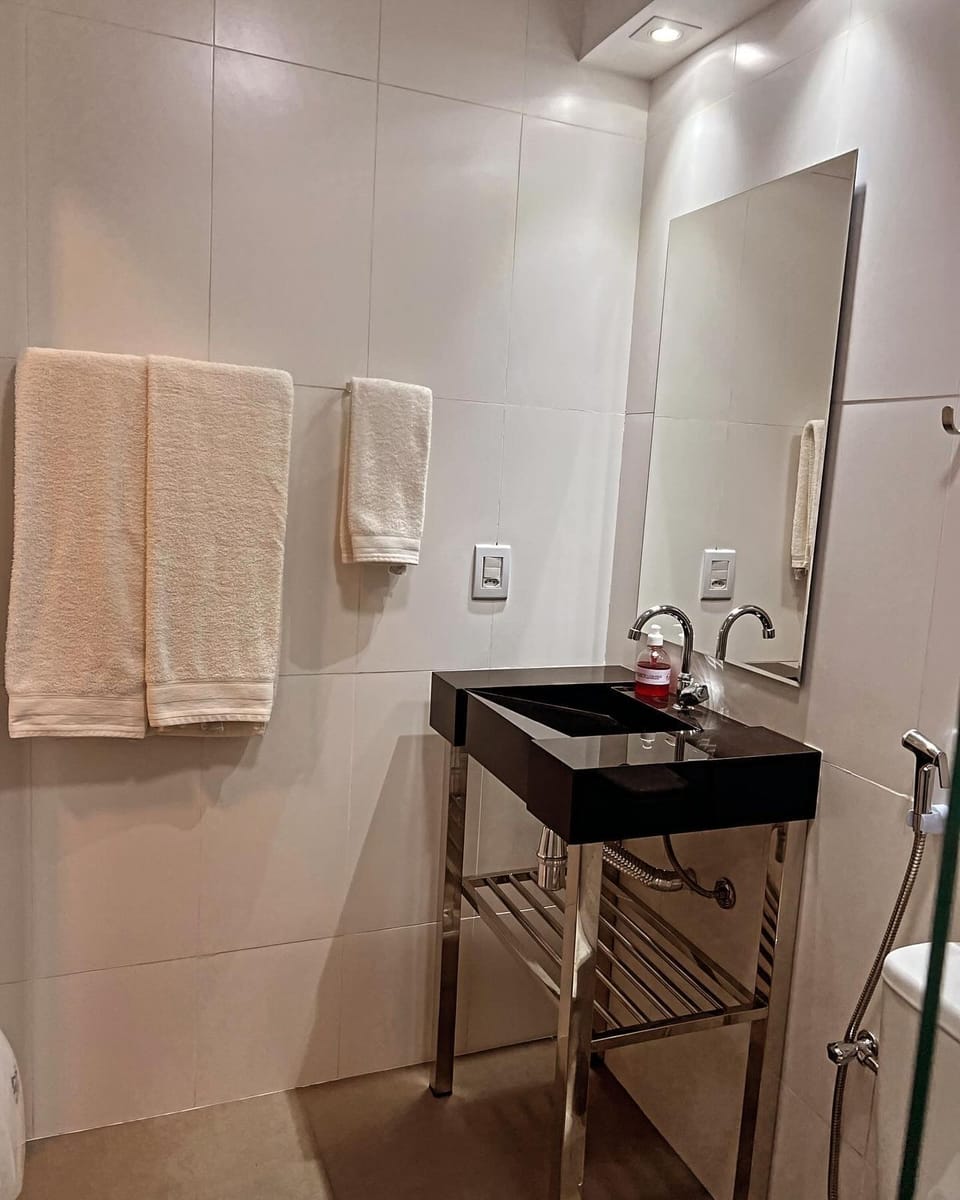 Deluxe Double Room | Bathroom | Shower, hair dryer, towels, soap