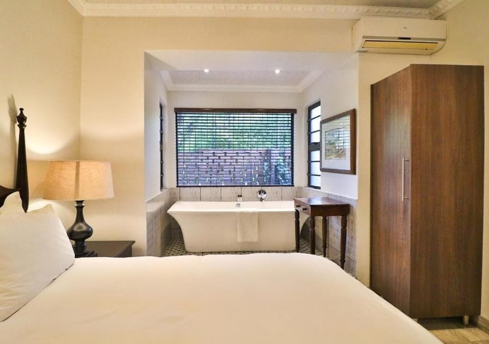 Deluxe Double Room, Patio, Garden View | In-room safe, desk, laptop workspace, soundproofing