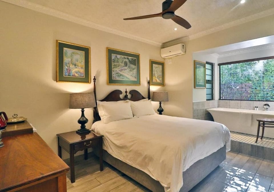 Deluxe Double Room, Patio, Garden View | In-room safe, desk, laptop workspace, soundproofing