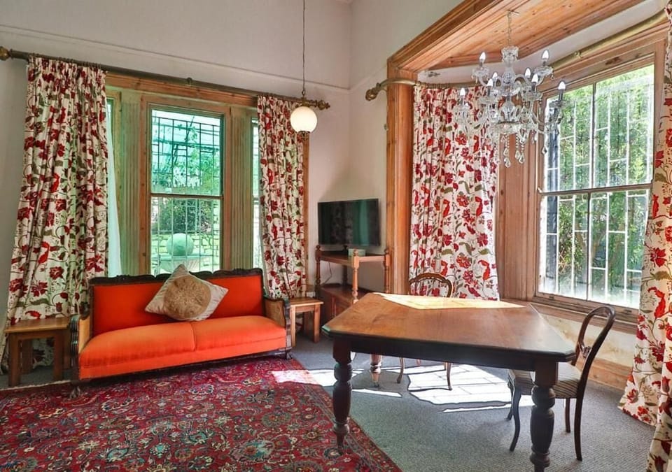Deluxe Double Room, Patio, Garden View | Living area
