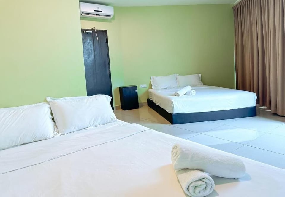Deluxe Quadruple Room, City View | Iron/ironing board, WiFi (free)