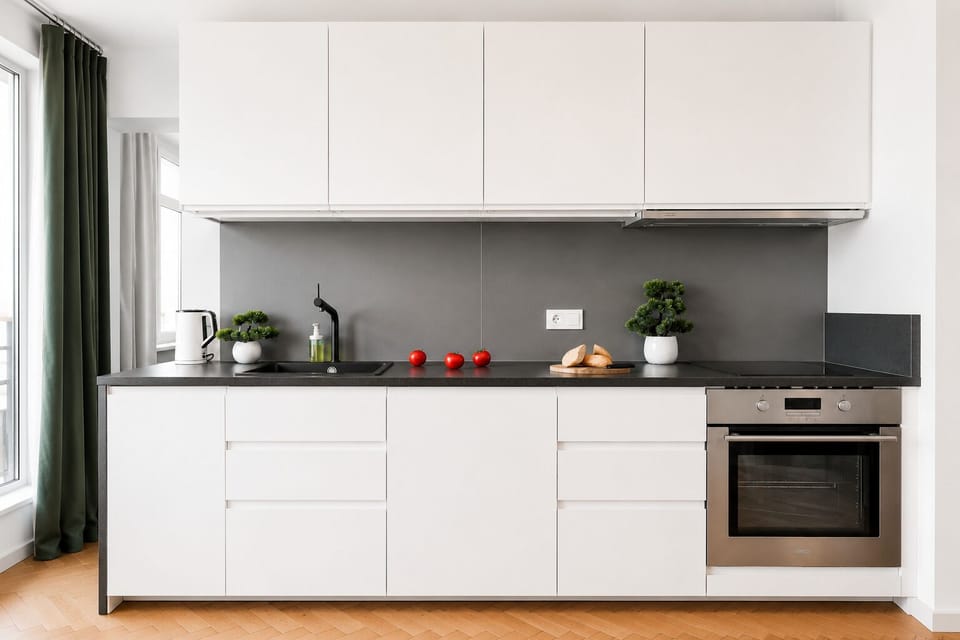 Deluxe Apartment, City View | Private kitchen | Electric kettle, highchair, griddle, cleaning supplies