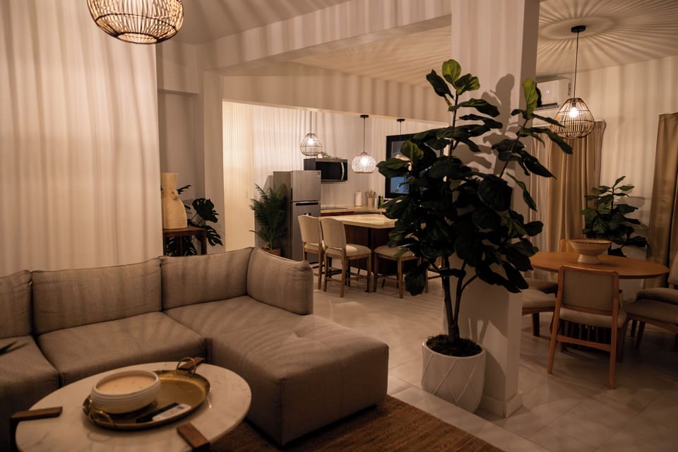 Superior Apartment, Pool View | Living area | 55-inch flat-screen TV with digital channels