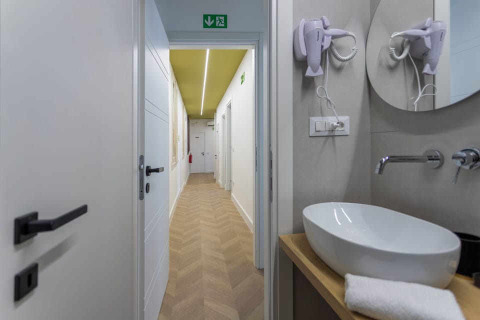 Comfort Double or Twin Room | Bathroom | Shower, eco-friendly toiletries, hair dryer, towels