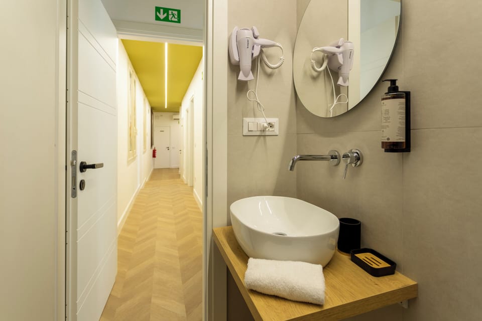 Comfort Double or Twin Room | Bathroom | Shower, eco-friendly toiletries, hair dryer, towels