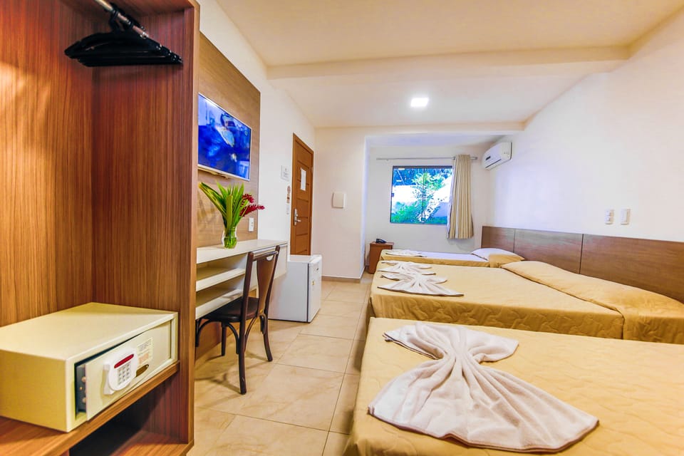 Standard Room | Minibar, in-room safe, blackout drapes, free cribs/infant beds