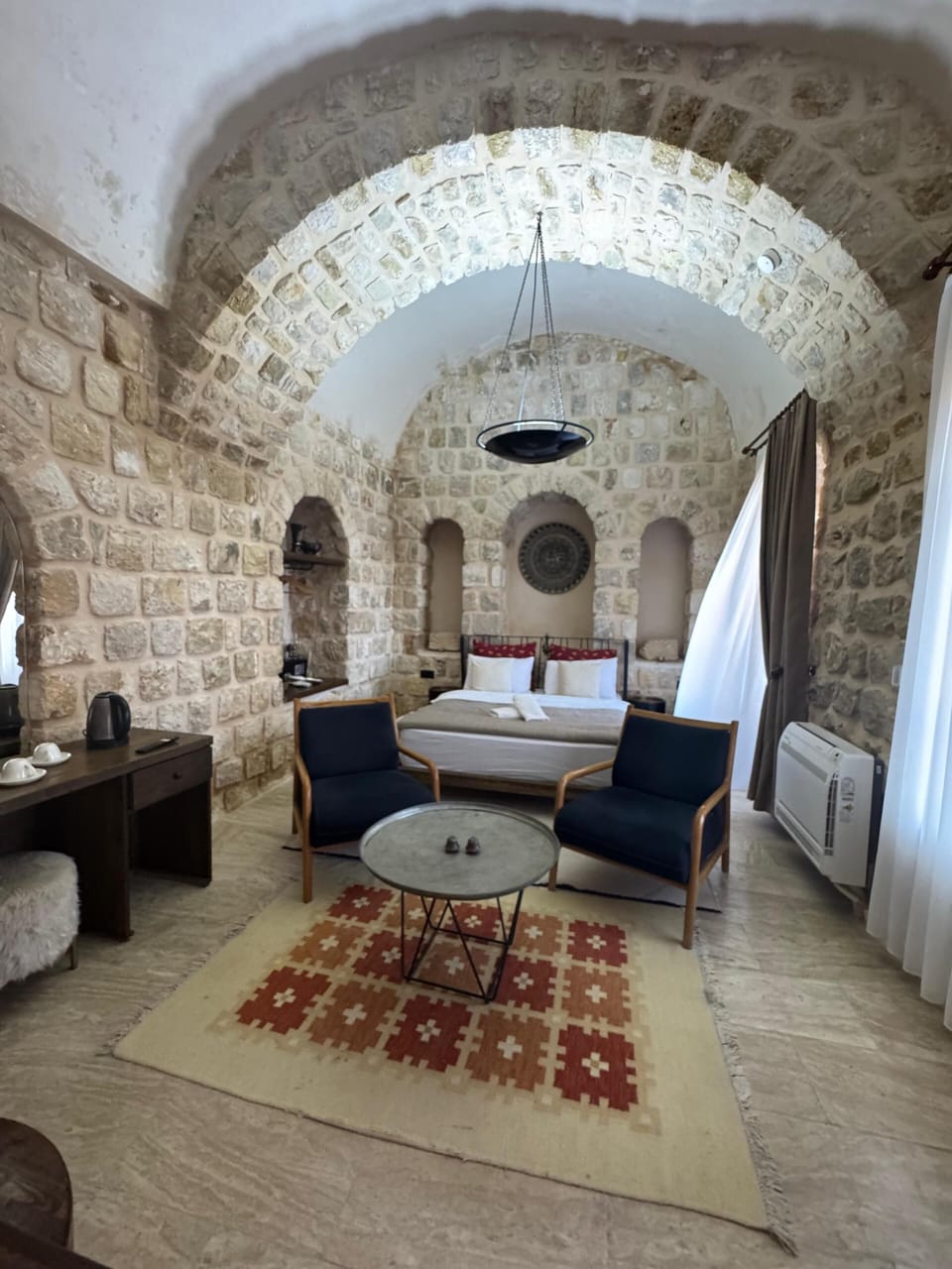 Deluxe Suite, Housekeeping, Garden View | Minibar, in-room safe, blackout drapes, soundproofing