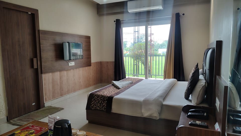 Deluxe Double Room, Balcony, Garden View | Garden view