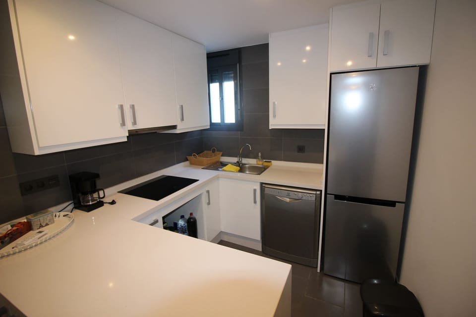 Coffee/tea maker, microwave, dishwasher, cookware/dishes/utensils