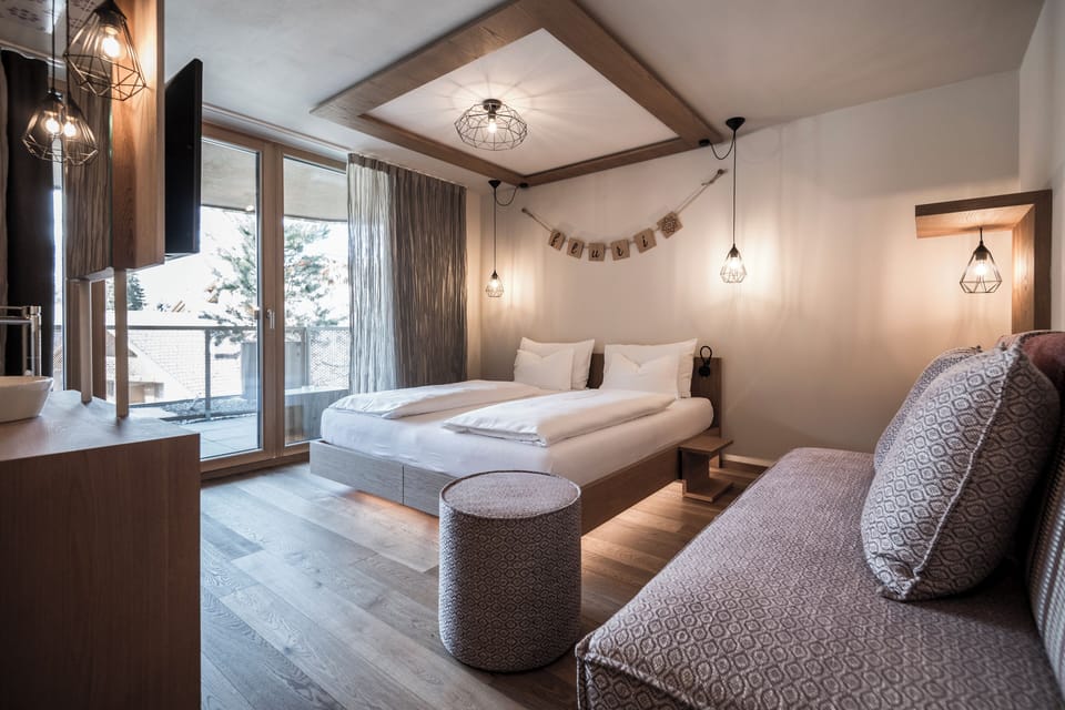 Deluxe Double Room, Balcony, Mountain View | Bathroom | Slippers, soap, shampoo, toilet paper