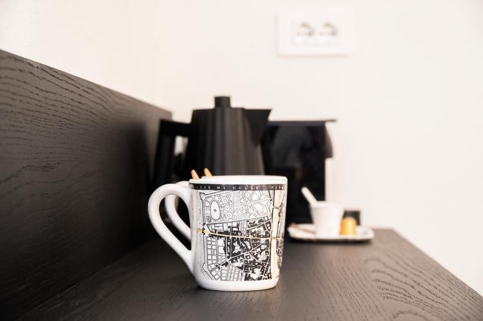 Deluxe Double Room, City View | Coffee and/or coffee maker