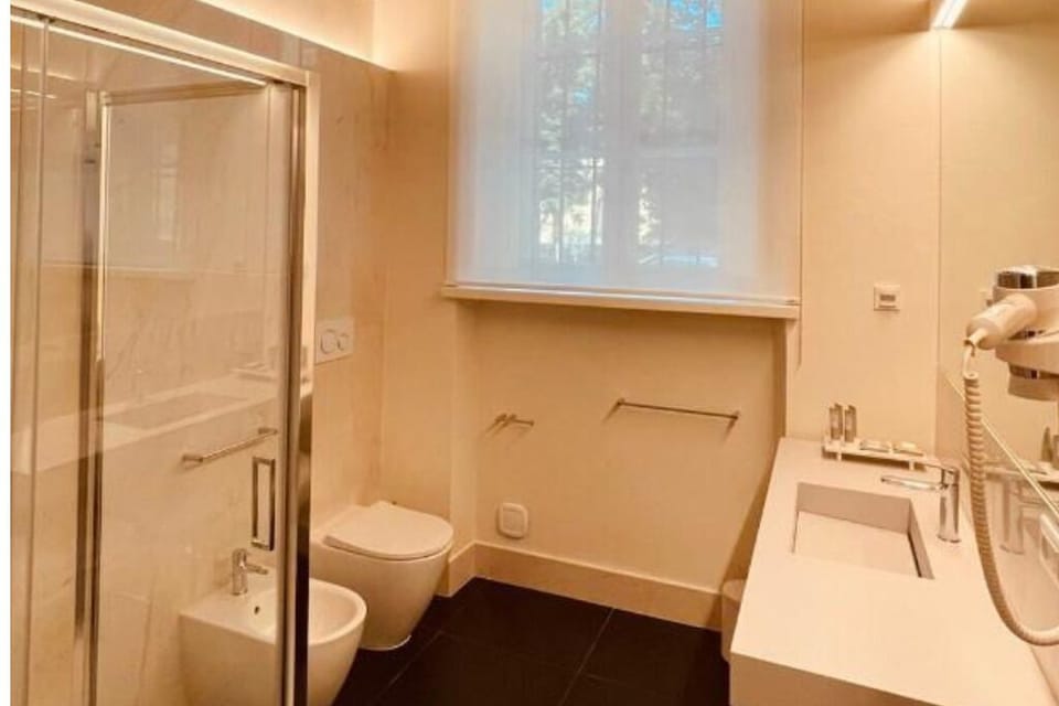 Bathroom | Shower, hair dryer, towels, soap