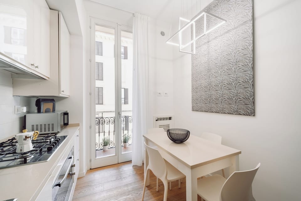 Comfort Apartment | Private kitchen | Espresso maker, coffee/tea maker, electric kettle, highchair