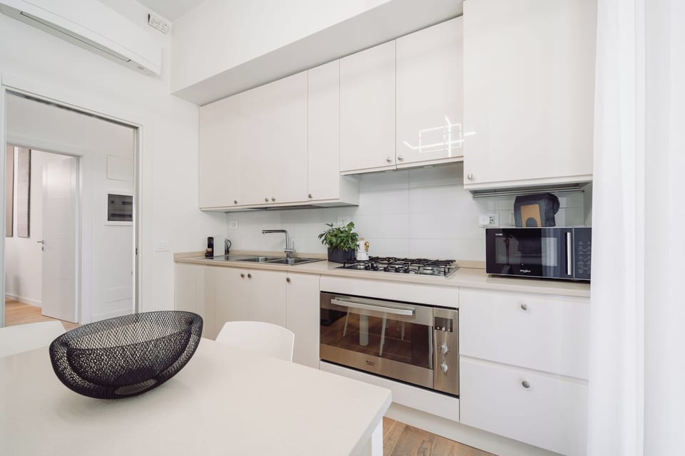 Comfort Apartment | Private kitchen | Espresso maker, coffee/tea maker, electric kettle, highchair