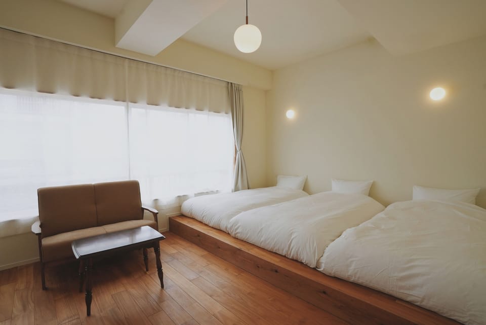 Triple Room, City View | Desk, laptop workspace, WiFi (free), bed sheets
