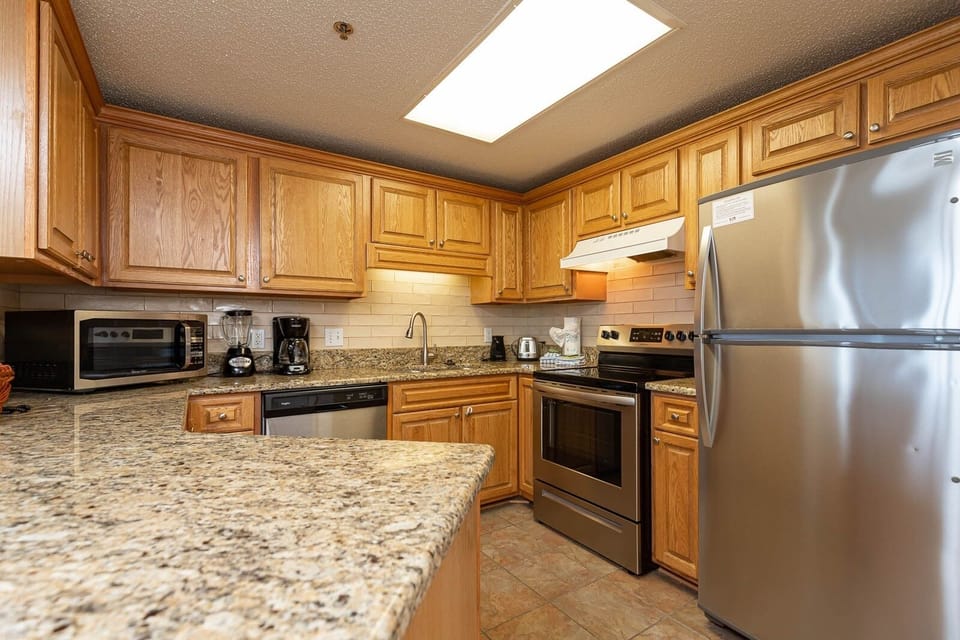 Condo, 2 Bedrooms | Private kitchen | Coffee/tea maker, fridge, oven